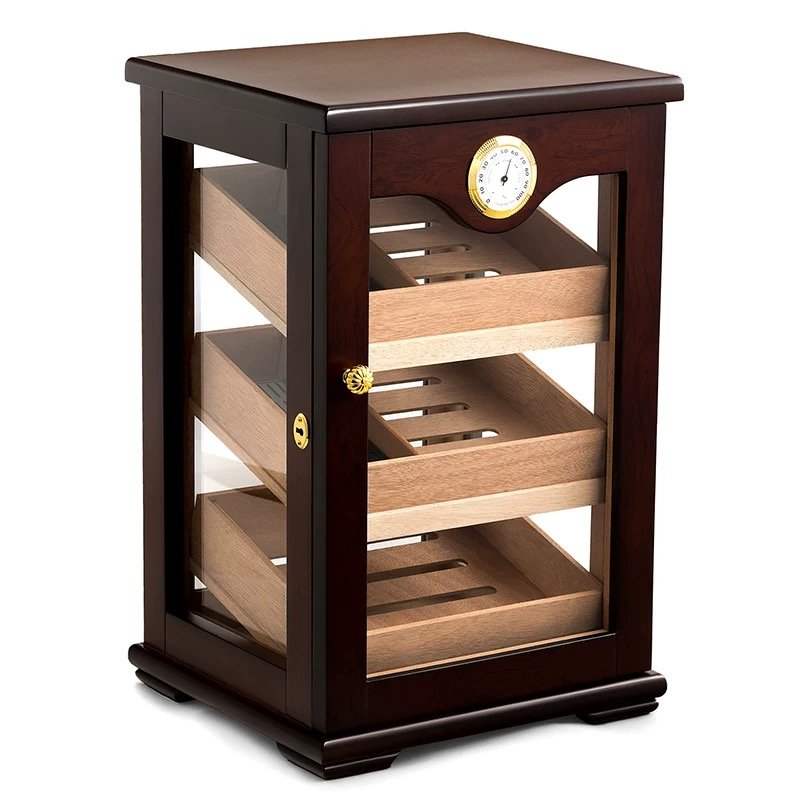 Armadio humidor in legno con porta in vetro, igrometro incorporato e tre ripiani scorrevoli per la conservazione dei sigari.