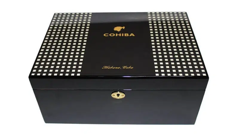 Glossy piano lacquer cigar box on dark surface