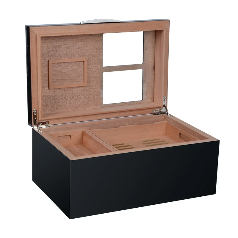 Open black cigar humidor with glass windows