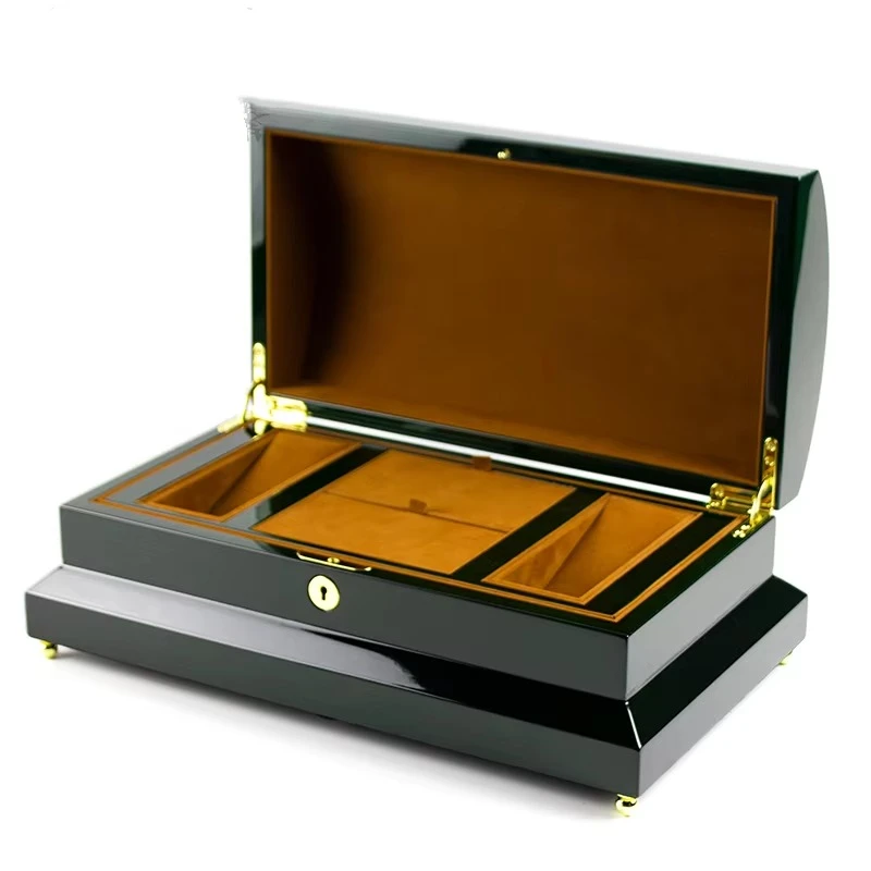 Glossy black perfume box with golden brown interior