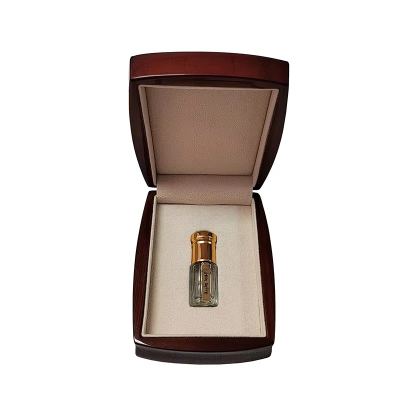 Small wooden perfume box with single glass bottle