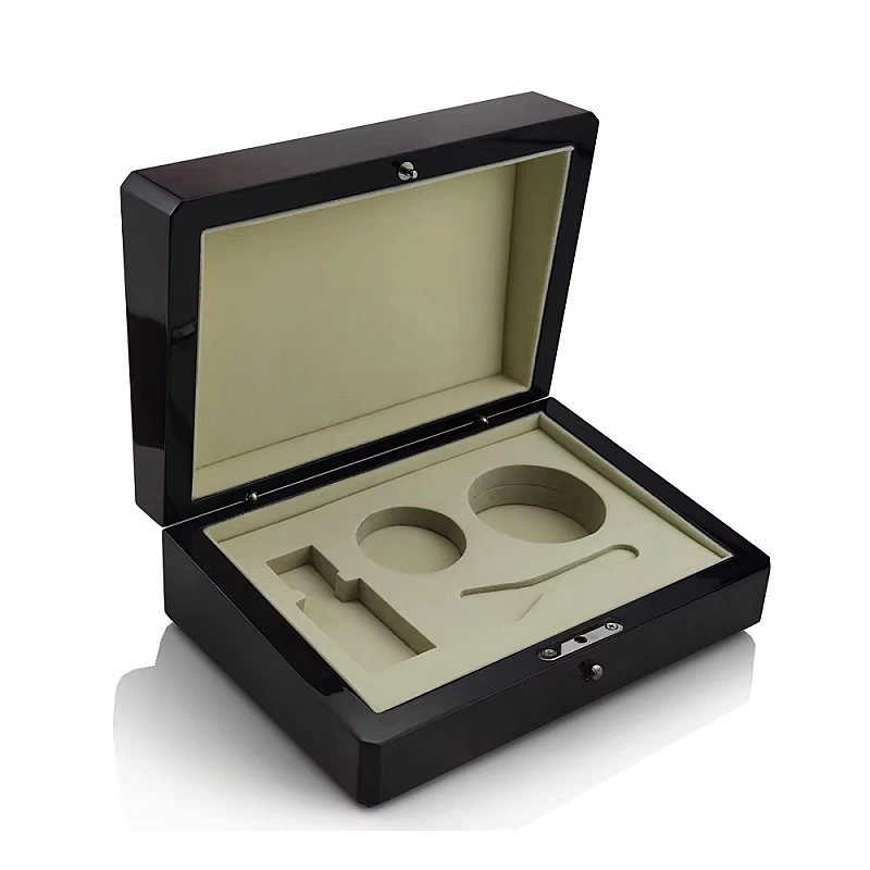 Open black perfume box with beige custom foam insert