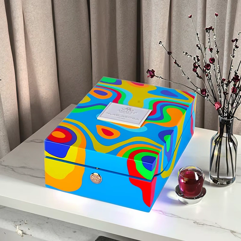 Colorful AMAFFI perfume box on table