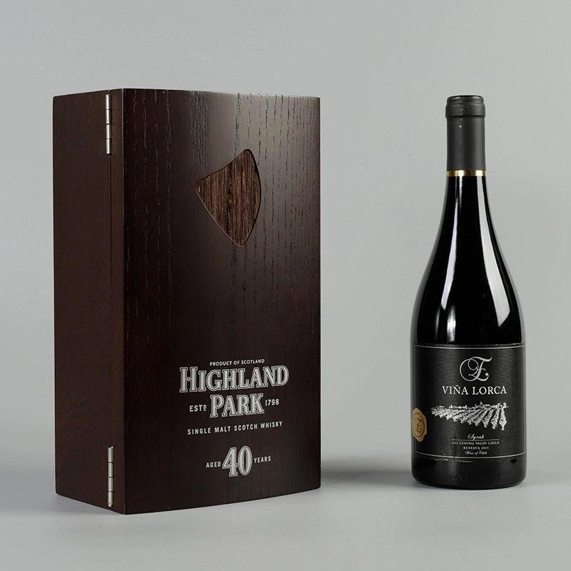 Highland Park 40 Years Old whisky box next to Viña Lorca wine bottle