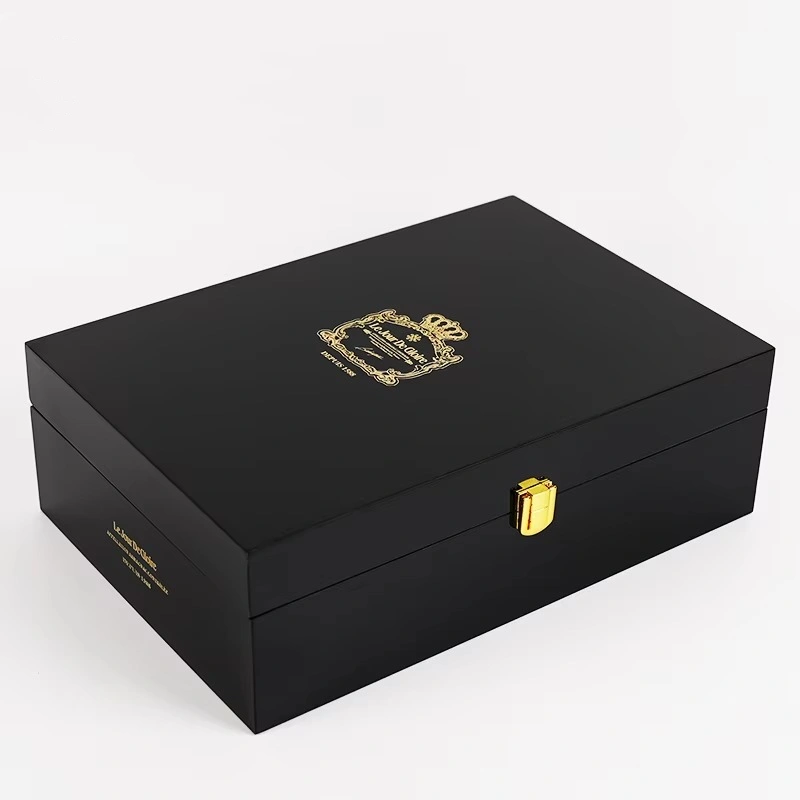Black whisky box with gold crest and lock