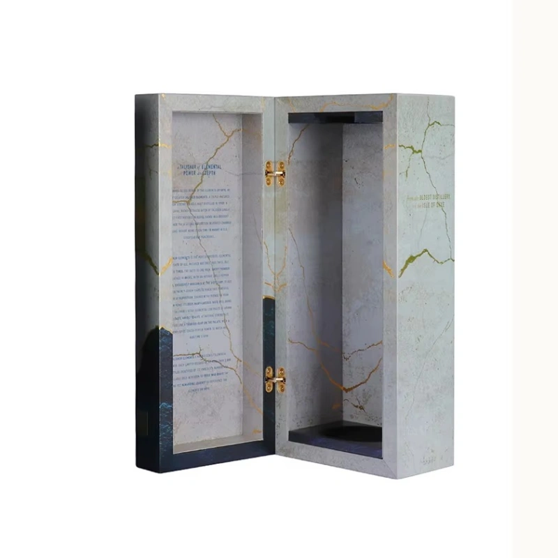 Open Talisker Elements whisky box with gold crack design